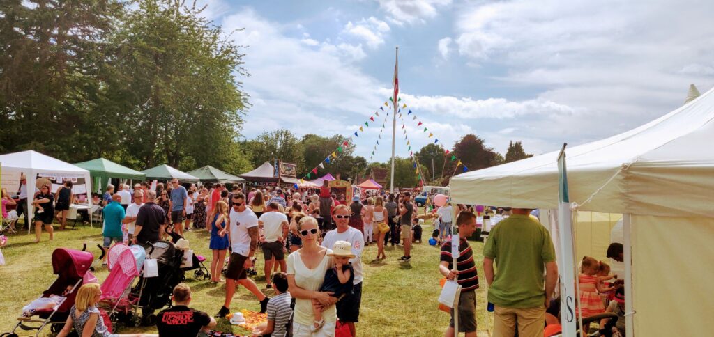 Outside stalls on the green at the Rowlands Castle Village Fair